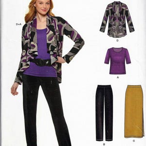 May include: A woman models a New Look sewing pattern for knit clothing. The pattern includes a jacket with a purple, gray, and black print, a purple top, black pants, and a mustard-colored skirt. The pattern number is 6315.