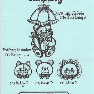 May include: A light blue paper pattern from the Lovey Bunny Company, featuring illustrations of stuffed animal lamps and other designs. The pattern includes a bunny, kitty, bear, and lion. The text reads "18" All Fabric Stuffed Lamps."