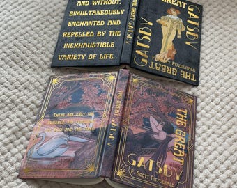 May include: Several copies of "The Great Gatsby" by F. Scott Fitzgerald. The book covers feature gold lettering and art deco illustrations. One cover displays a quote, while others show stylized figures and landscapes.