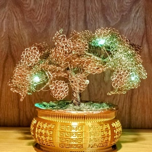 Árbol de cobre iluminado hecho a mano