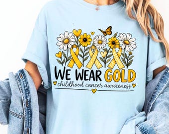 We Wear Gold Childhood Cancer Awareness Shirt, Ribbon Daisy Sunflower T-Shirt, Gold September Tee