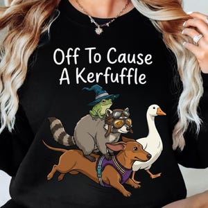 Off To Cause A Kerfuffle Shirt, Frog Raccoon Dachshund Goose Apparel