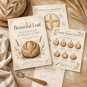 May include: A collection of sourdough baking guides and scoring diagrams. The main guide, "The Beautiful Loaf," features a bread loaf illustration. Other guides show scoring patterns. A bread lame and a loaf of bread are also visible.