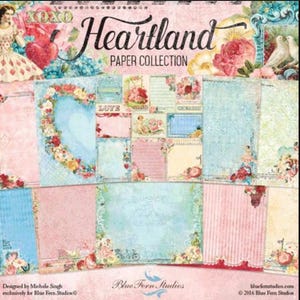 May include: A collection of scrapbook paper sheets with a floral and vintage theme. The "Heartland Paper Collection" features various designs, including a heart-shaped floral arrangement, stripes, and floral borders. The color palette includes pink, blue, and cream tones.
