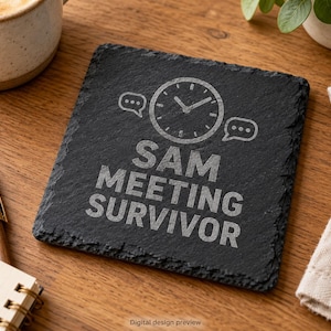 May include: A square black slate coaster with rough, natural edges. The surface features an engraved design of a clock face flanked by two speech bubbles, with the text "SAM MEETING SURVIVOR" printed in a bold, sans-serif font below the clock.