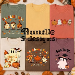 May include: A collection of six t-shirts in various colors including olive green, yellow, terracotta, cream, brown, and mauve. Each shirt features unique autumn-themed graphic prints with characters like ghosts, pumpkins, leaves, and pizza slices.