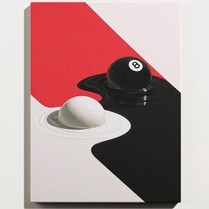 May include: A canvas print featuring a striking abstract design. The artwork showcases a black eight ball and a white sphere, set against a backdrop of red, black, and white geometric shapes. The composition creates a visual contrast.
