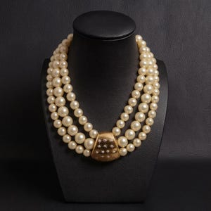 Vintage Givenchy Triple-Strand Pearl Necklace with Gold Starburst Clasp