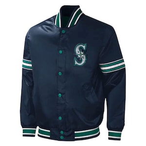 May include: Navy blue satin baseball jacket with green and white striped accents. Features a green and white collar, cuffs, and hem. The jacket has a button-up front and a team logo patch on the chest.