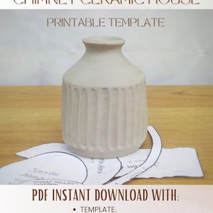 May include: A light beige ceramic vase with a ribbed texture and a narrow neck. The vase is displayed alongside paper cutouts of a printable template. Text on the image reads: CHIMNEY CERAMIC HOUSE PRINTABLE TEMPLATE and PDF INSTANT DOWNLOAD WITH: TEMPLATE. STEP BY STEP INSTRUCTIONS ESPAÑOL + ENGLISH.