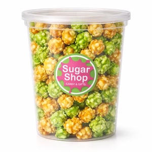 May include: A clear plastic container filled with colorful candy-coated popcorn. The popcorn is a mix of green and golden-brown pieces. A sticker on the container reads "Sugar Shop CANDY & GIFTS".