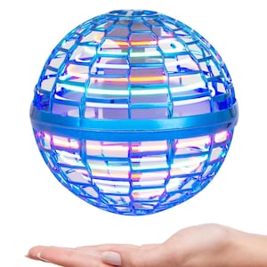 May include: A blue and clear orb-shaped toy with a grid-like design, illuminated with colorful lights. The toy is suspended above an open hand against a white background. The toy appears to be a futuristic or novelty item.