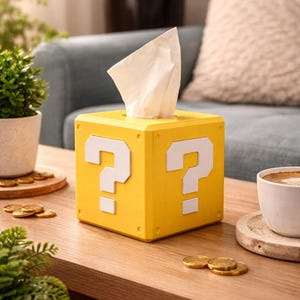 Może przedstawiać: Zestaw trzech ceramicznych kubków z nakrapianym, matowym wykończeniem. Kubki są w odcieniach kremu, jasnoszarym i ciemnoszarym. Każdy kubek ma prosty, minimalistyczny design, idealny do kawy lub herbaty.