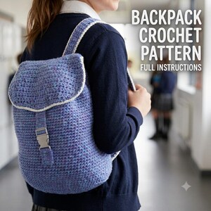 May include: A blue speckled crochet backpack with a flap closure, white trim, and a silver-toned plastic buckle. The text on the image reads BACKPACK CROCHET PATTERN FULL INSTRUCTIONS. The backpack is worn over the shoulders with matching straps.