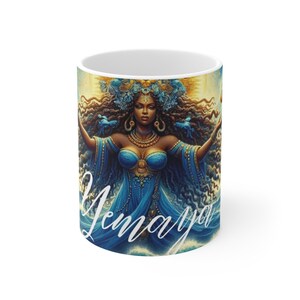 May include: A white ceramic mug with a black handle and the text "But First, Coffee" in a bold, black font. The mug is set against a blurred background, suggesting a cozy setting.