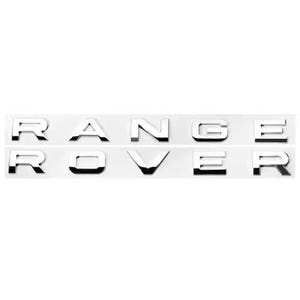 Puede incluir: Juego de emblemas cromados "RANGE ROVER". Las letras están en negrita, sin serifa, montadas sobre un fondo blanco. El emblema está diseñado para aplicaciones automotrices, probablemente para el exterior de un vehículo.