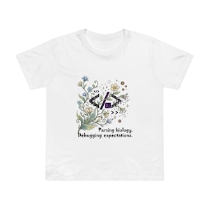 Puede incluir: Camiseta blanca con un diseño floral que incorpora símbolos de codificación y el texto "Parsing biology. Debugging expectations." El diseño presenta colores azules, amarillos y morados, ofreciendo una estética artística única.