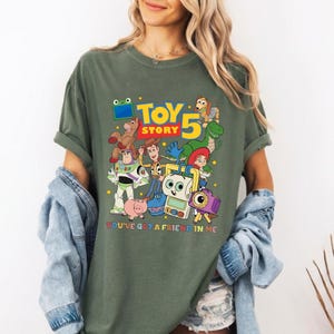 You'Ve Got A Friend In Me Comfort Colors Tee, Woody Buzz Etch Lenny Mr Spell Shirt, Family Vacation 2026 Trip, Pixar Toy Story 5 T-Shirt image 2