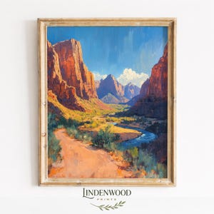 May include: Oil painting of a canyon landscape with a river and a dirt road. The artwork features vibrant colors, including orange, blue, and green. The painting is framed in a gold-colored wooden frame. The text "LINDENWOOD PRINTS" is at the bottom.