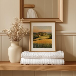 Cozy landscape oil painting for living room — inviting fields and a charming cottage create a warm pastoral atmosphere.