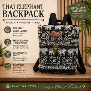 May include: A black and white Thai elephant backpack made from woven cotton. It has a secure closure, inner and zipper pockets, and a drawstring closure. The text on the bag says "Thai Elephant Backpack".