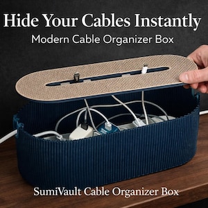 May include: A navy blue cable organizer box with a textured exterior and a beige lid. The lid has slots for cables to pass through. The text "Hide Your Cables Instantly" and "Modern Cable Organizer Box" are visible.