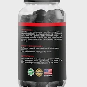 May include: A clear plastic bottle with a black cap and label, filled with dark softgels. The label includes text in Spanish, the GMP and Premium logos, and a "Made in USA" label.