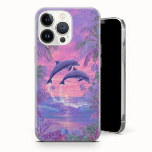 May include: A phone case featuring a vibrant illustration of two dolphins leaping from the ocean under a pink and purple sunset sky. Palm trees and tropical foliage frame the scene, creating a dreamy, aquatic aesthetic.