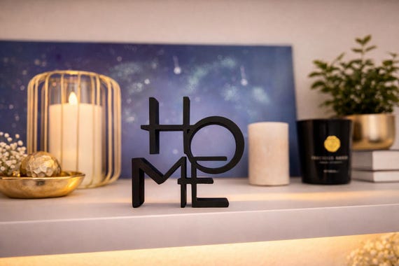 Modern HOME lettering in a minimalist design. Perfect as a stylish decoration for a shelf, sideboard or living room.