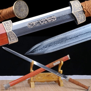 May include: A detailed image of a decorative sword with a silver blade and a wooden handle. The handle is wrapped in brown cord. The sword features ornate metalwork and a dragon design.