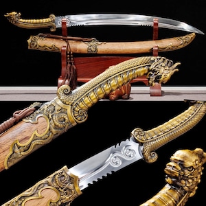 May include: An ornate sword with a curved, silver blade and a gold-colored handle featuring a dragon design. The wooden scabbard is also adorned with gold dragon detailing. The sword is displayed on a wooden stand.