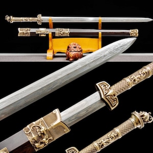 May include: An ornate sword with a silver blade and a decorative gold handle. The sword is displayed on a wooden stand, showcasing its intricate design and craftsmanship. The handle features dragon motifs.
