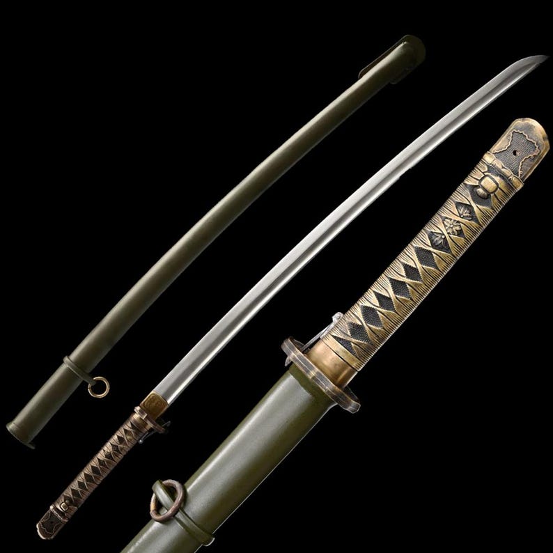May include: An antique Japanese katana sword with a silver blade and a decorative handle. The handle is wrapped in a diamond pattern with gold accents. The scabbard is olive green.