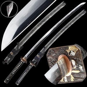 May include: A detailed image of a katana sword, showcasing its sharp, curved blade and intricate handle. The sword features a black handle with a diamond pattern, a silver blade, and a decorative guard. The image highlights the craftsmanship and design of the traditional Japanese weapon.