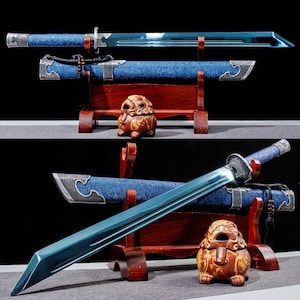 May include: Two blue-bladed swords with ornate blue handles and scabbards, displayed on wooden stands. The blades have a slight curve and are set against a dark background. A small, decorative lion statue is also present.