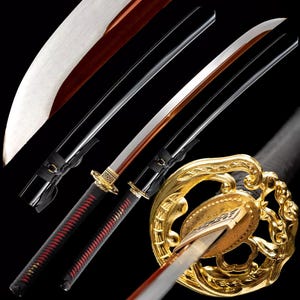 May include: Three Japanese katanas with black lacquered scabbards and ornate gold and black tsubas. The blades have a silver finish with a copper-colored ridge. The handles are wrapped in black with red stitching.