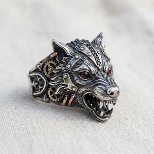 Fenrisvargring, sterlingsilver, nordisk vikingring med steampunkmotiv, smycken med röda ögon