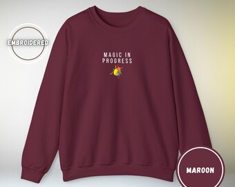 Magic in Progress Embroidered Sweatshirt | Minimal Motivational Crewneck, Premium Unisex Embroidery, Cozy Everyday Wear