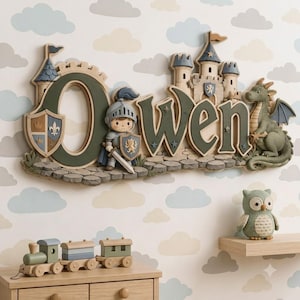 May include: A wall-mounted name sign spelling Owen in dark green letters, featuring a knight in armor with a sword and shield, a stone castle with blue turrets, and a green dragon. The design includes a stone-textured base and small star accents.