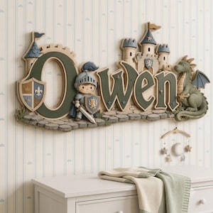 May include: A wall-mounted name sign spelling Owen in dark green letters, featuring a stone castle, a knight in silver armor holding a sword and shield, and a green dragon. The design includes a shield with a fleur-de-lis and a stone path base.