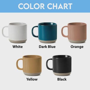 May include: A colour chart showing five ceramic mugs in white, dark blue, orange, yellow, and black. Each mug has a light-coloured base and a matching handle. The text "COLOR CHART" is at the top, with each colour labelled below the mugs.