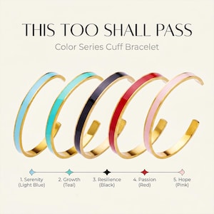 May include: Five gold-tone cuff bracelets with enamel inlay in light blue, teal, black, red, and pink. The text reads THIS TOO SHALL PASS Color Series Cuff Bracelet, with a legend listing 1. Serenity, 2. Growth, 3. Resilience, 4. Passion, 5. Hope.