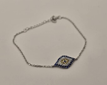 Bracciale a catena con occhio di Allah in argento sterling 925, con maglie delicate tempestate di zirconi blu.