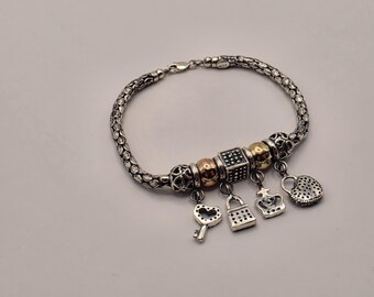 Bracciale con ciondoli in argento sterling 925, catena a serpente con ciondoli misti.
