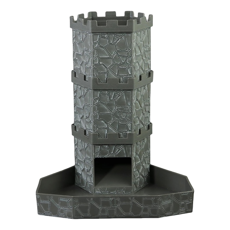 May include: A gray, three-tiered castle tower with a stone-like texture. The tower has a crenelated top and a rectangular opening on the front. The base is a wide, hexagonal shape.