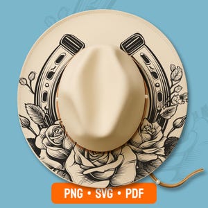 May include: A cream-coloured cowboy hat with a tan crown, decorated with black horseshoe and rose illustrations. The hat has a brown leather chin strap and the text "PNG • SVG • PDF" in an orange rectangle.