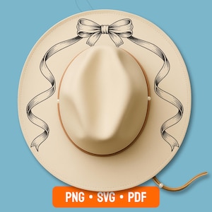 Puede incluir: Un sombrero color crema con ala marrón y un diseño decorativo de lazo y cinta negros. El sombrero tiene una correa para la barbilla y el texto "PNG • SVG • PDF" en un rectángulo naranja.