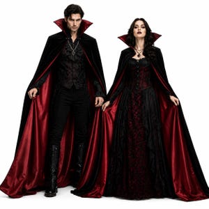 May include: Two floor-length velvet capes with high stand-up collars, featuring black outer fabric and deep red satin lining. The outfits include a black patterned vest with a ruffled shirt and a dark red and black corset dress with lace details.