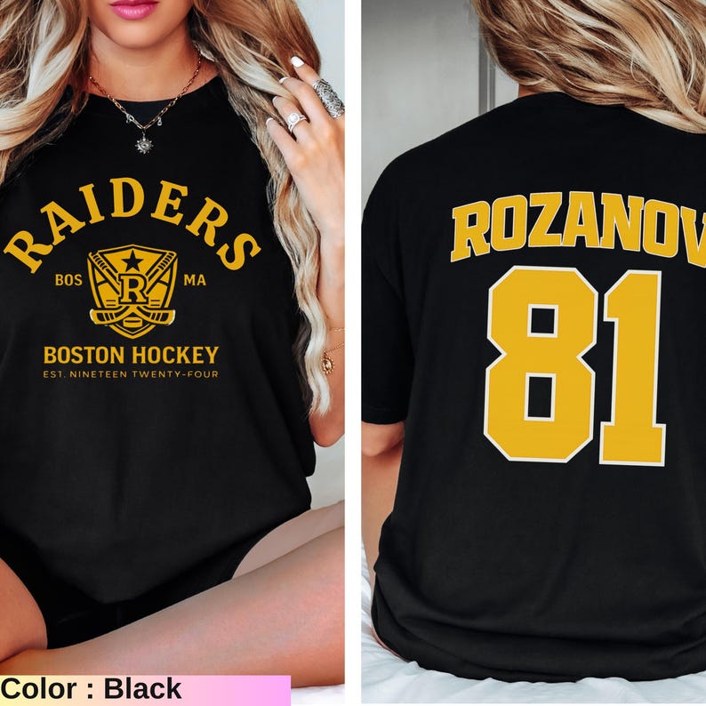 May include: Black t-shirt with "RAIDERS" and "BOSTON HOCKEY" in gold lettering. The front features a hockey-themed logo. The back displays "ROZANOV" and the number "81" in gold. A sports-themed apparel item.