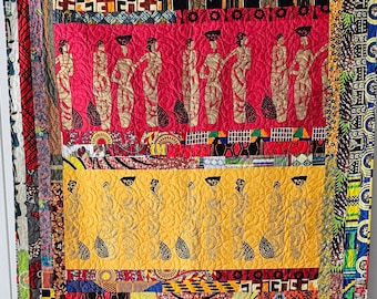 African Handprint Crimson and Saffron large throw quilt with contemporary wax print borders and binding